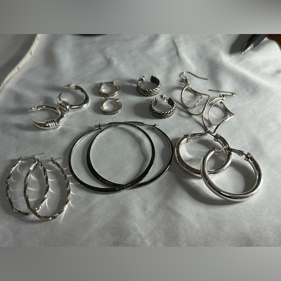 7 pair of various silvertone hoop earrings - Picture 1 of 9